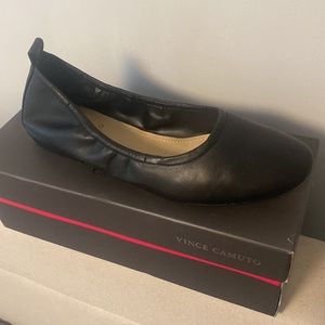 Brand New. Vince Camuto black flats. Size 9. Never worn